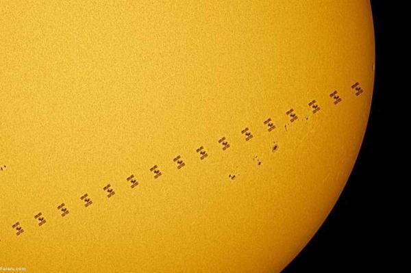 تصاویر شگفت انگیز از لحظه عبور ایستگاه فضایی بین المللی از مقابل خورشید